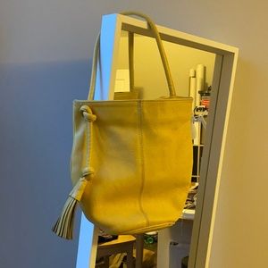Vintage yellow leather bucket bag